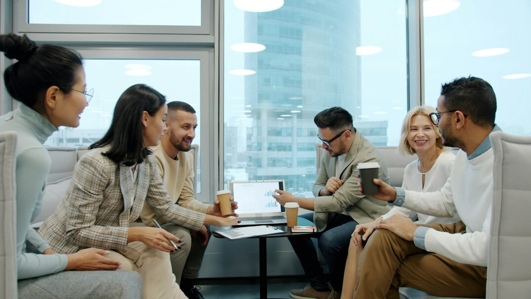 group of friends discussing trends
